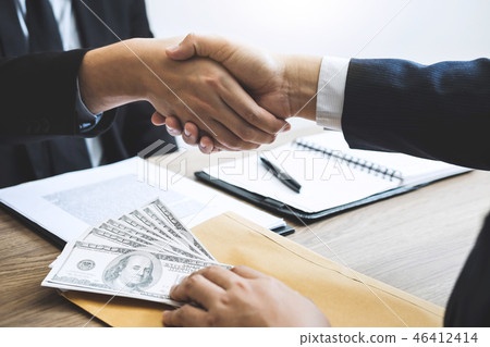 Dishonest cheating in business illegal money, Businessman handsh Dishonest cheating in business illegal money, Businessman handsh 46412414