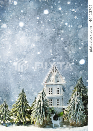 Frosty winter wonderland forest with snowfall, houses and trees. Christmas greetings concept Frosty winter wonderland forest with snowfall, houses and trees. Christmas greetings concept 46413705