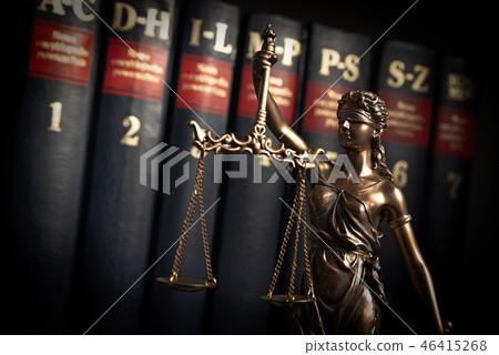Statue of justice on books background 46415268