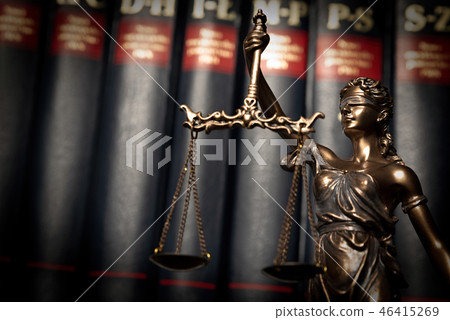Statue of justice on books background Statue of justice on books background 46415269