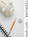 Piggy bank, pencil, eraser, notes 46416442