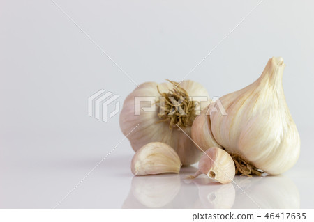 Two garlic on white background. Two garlic on white background. 46417635