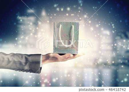 Man presenting his gift 46418742