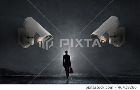 Camera keep an eye on woman Camera keep an eye on woman 46419266