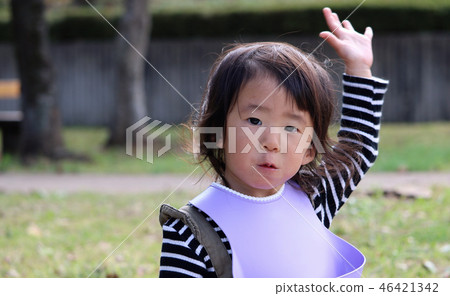 A girl holding a hand A girl holding a hand 46421342