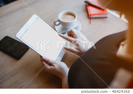 Tablet in a woman hands 46424168
