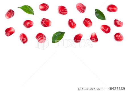 pomegranate seeds with leaves isolated on white background with copy space for your text. Top view pomegranate seeds with leaves isolated on white background with copy space for your text. Top view 46427889