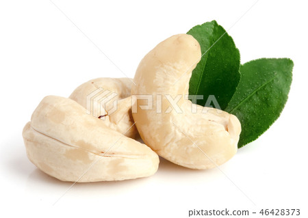 cashew nuts with leaf isolated on white background. macro cashew nuts with leaf isolated on white background. macro 46428373