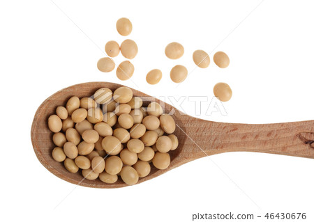 soybeans in wooden spoon isolated on white background top view 46430676