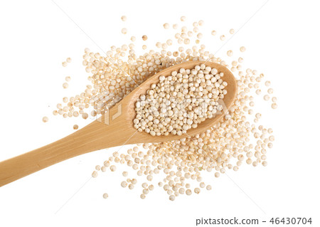 red quinoa seeds in wooden spoon isolated on white background. Top view red quinoa seeds in wooden spoon isolated on white background. Top view 46430704