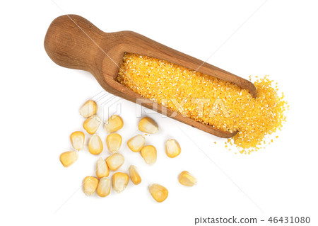 corn groats or cornmeal in wooden scoop isolated on white background. Top view. Flat lay corn groats or cornmeal in wooden scoop isolated on white background. Top view. Flat lay 46431080