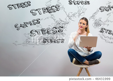 Stress theme with young woman using her laptop  46431999