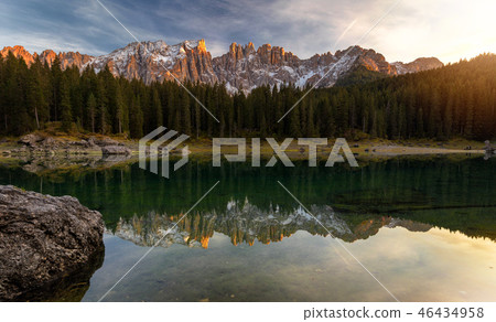 Sunset at Carezza lake with beautiful reflections 46434958