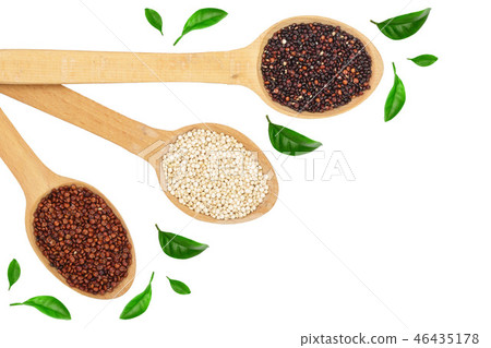 Black red white quinoa seeds in wooden spoon with leaves isolated on white background with copy 46435178