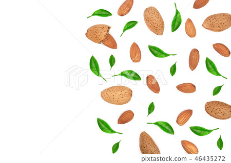 almonds decorated with leaves isolated on white background with copy space for your text. Top view almonds decorated with leaves isolated on white background with copy space for your text. Top view 46435272