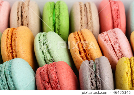 colorful macarons as a background closeup macro 46435345