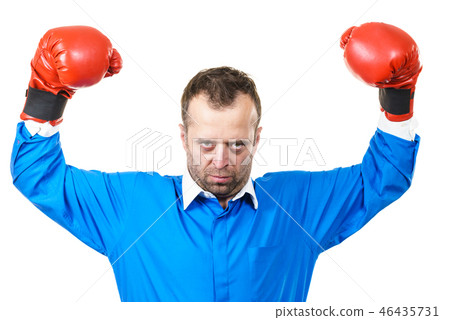 Adult man wearing boxing gloves Adult man wearing boxing gloves 46435731