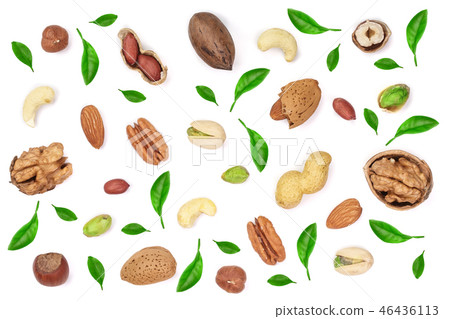 mix of different nuts decorated with green leaves isolated on white background, Flat lay pattern mix of different nuts decorated with green leaves isolated on white background, Flat lay pattern 46436113