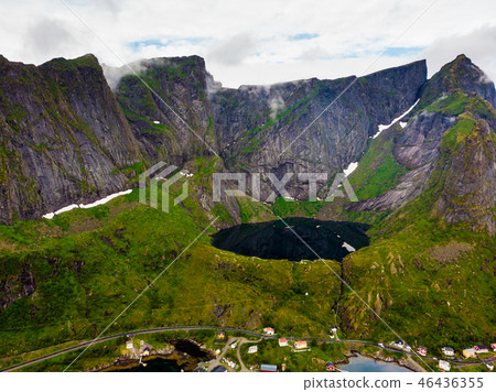 Mountain lake and Reine village, Lofoten islands Norway Mountain lake and Reine village, Lofoten islands Norway 46436355