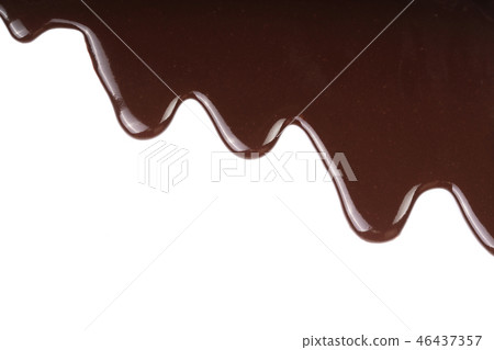 Melted chocolate dripping isolated on white background 46437357