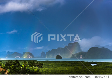 A rainbow appears over the island of Phuket. A rainbow appears over the island of Phuket. 46437481