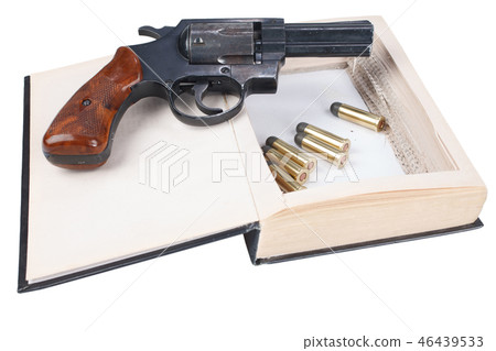 Revolver gun with cartridges hidden in a book 46439533