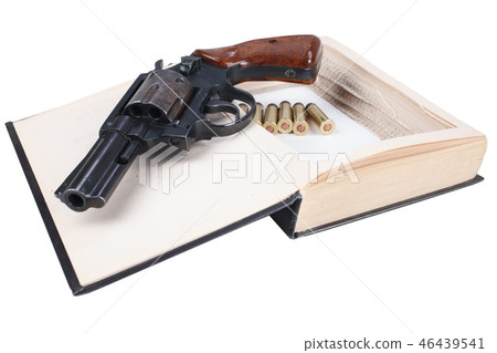 Revolver gun with cartridges hidden in a book 46439541