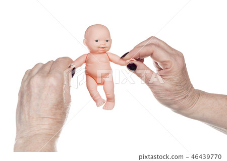 senile female hands playing doll senile female hands playing doll 46439770