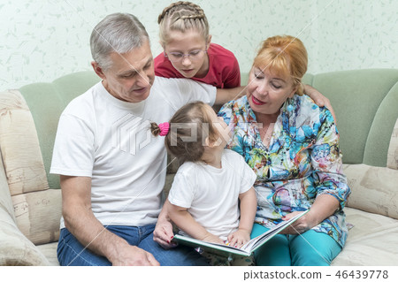 Grandmother and grandfather teach granddaughters Grandmother and grandfather teach granddaughters 46439778