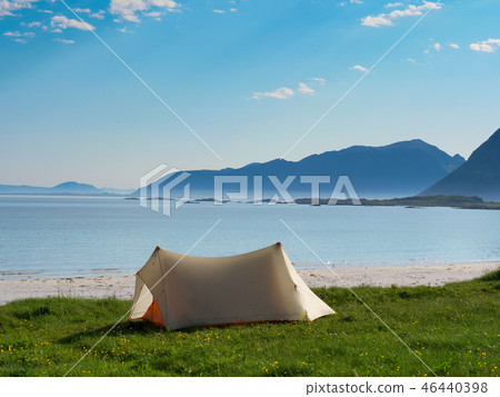 Seascape with tent on beach, Lofoten Norway Seascape with tent on beach, Lofoten Norway 46440398