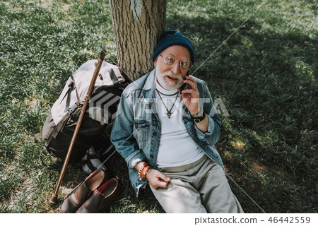 Senior man is resting in the park 46442559