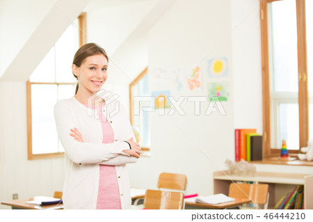 Female Teacher In A Classroom 46444210