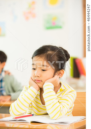 Young Student Looking Lost In Class Young Student Looking Lost In Class 46444247