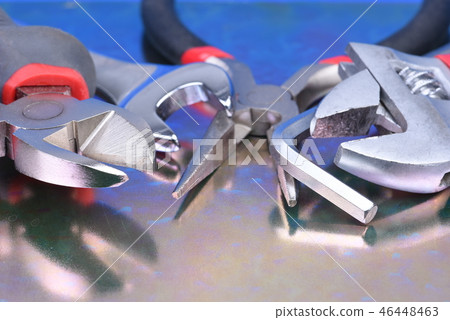Tools on metal surface close-up 46448463