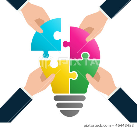 Puzzle light bulb and businessman hand Puzzle light bulb and businessman hand 46448488