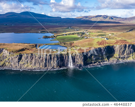 Aerial view of the dramatic coastline at the cliffs by Staffin with the famous Kilt Rock waterfall - Aerial view of the dramatic coastline at the cliffs by Staffin with the famous Kilt Rock waterfall - 46448837