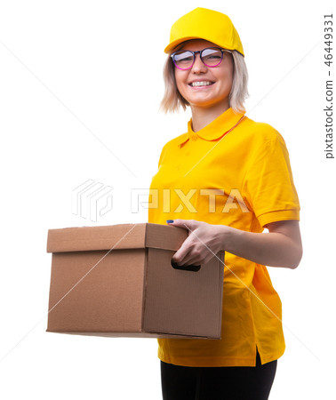 Picture of courier woman with glasses and yellow T-shirt with cardboard box in her hands 46449331