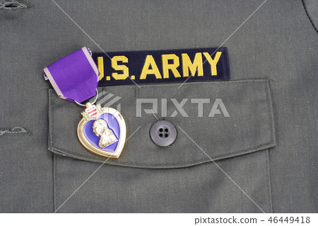 Purple Heart award on US ARMY olive green uniform 46449418