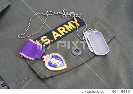 Purple Heart award on US ARMY olive green uniform Purple Heart award on US ARMY olive green uniform 46449419