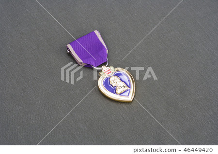 Purple Heart award on US ARMY olive green uniform Purple Heart award on US ARMY olive green uniform 46449420