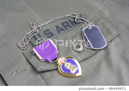 Purple Heart award on US ARMY green uniform Purple Heart award on US ARMY green uniform 46449451