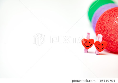 Heart-shaped stationary wooden tongs 46449704
