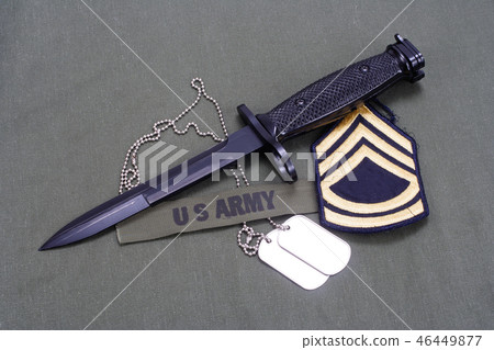 bayonet on US ARMY uniform background bayonet on US ARMY uniform background 46449877