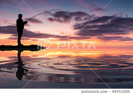 Fisherman on the lake against the sunset sky Fisherman on the lake against the sunset sky 46452080