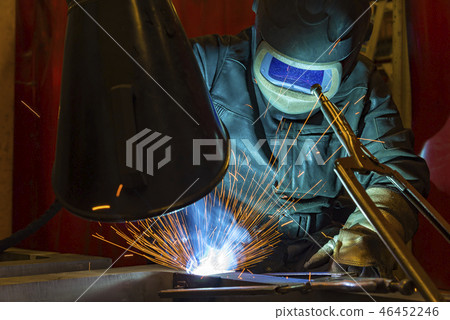 Industrial steel welder in factory welder, craftsm Industrial steel welder in factory welder, craftsm 46452246