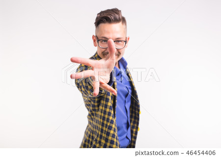 People and gesture concept - young man invite you to go with him, smiling, wearing glasses People and gesture concept - young man invite you to go with him, smiling, wearing glasses 46454406