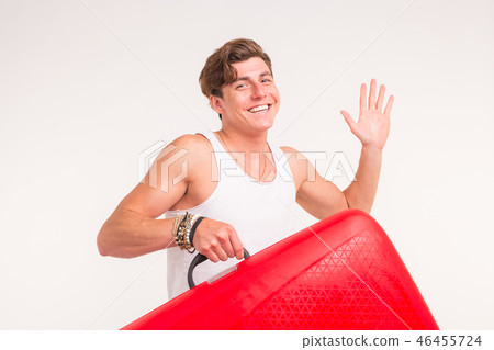 People, travelling and gesture concept - young man with suitcase saluting over white background People, travelling and gesture concept - young man with suitcase saluting over white background 46455724