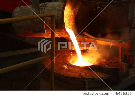 Molten iron pour from ladle into melting furnace 46456335