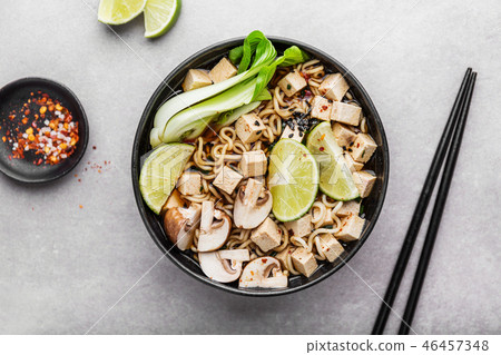 Tofu asian vegetarian soup served in bowl 46457348