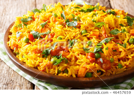 Vegetarian Indian rice with vegetables close-up 46457659
